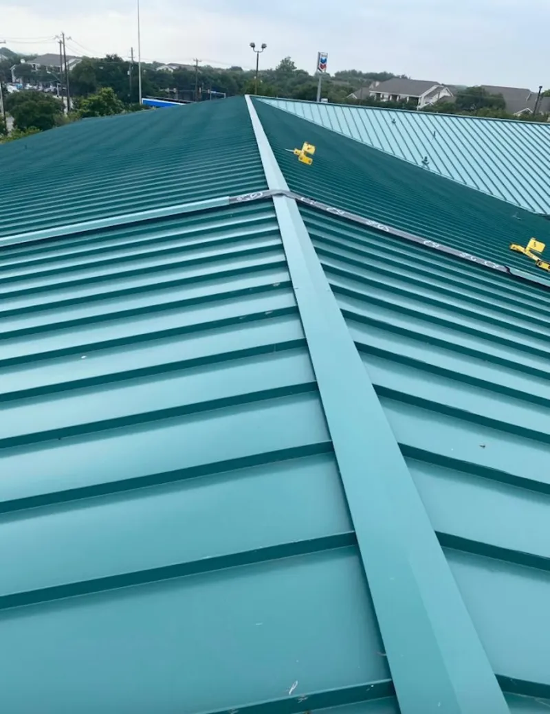 Green commercial metal roof ridge and valley for Metal Roof Repair in Woodinville